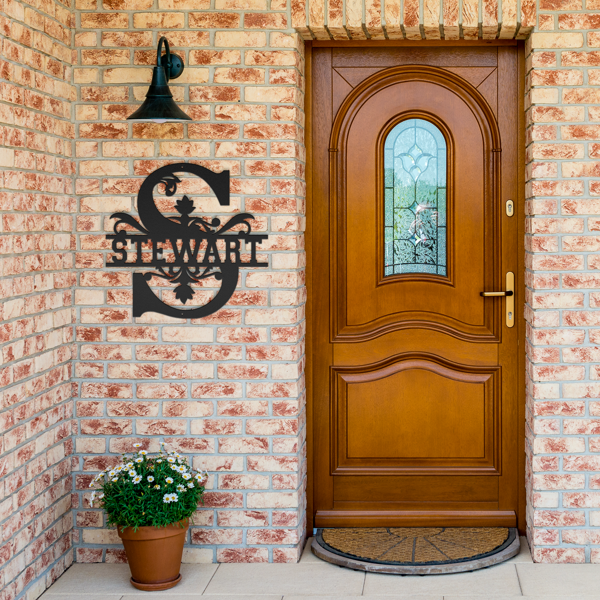 Stewart_Family_Monogram_Metal_Sign_Black_Brick_Entrance_Mockup.png